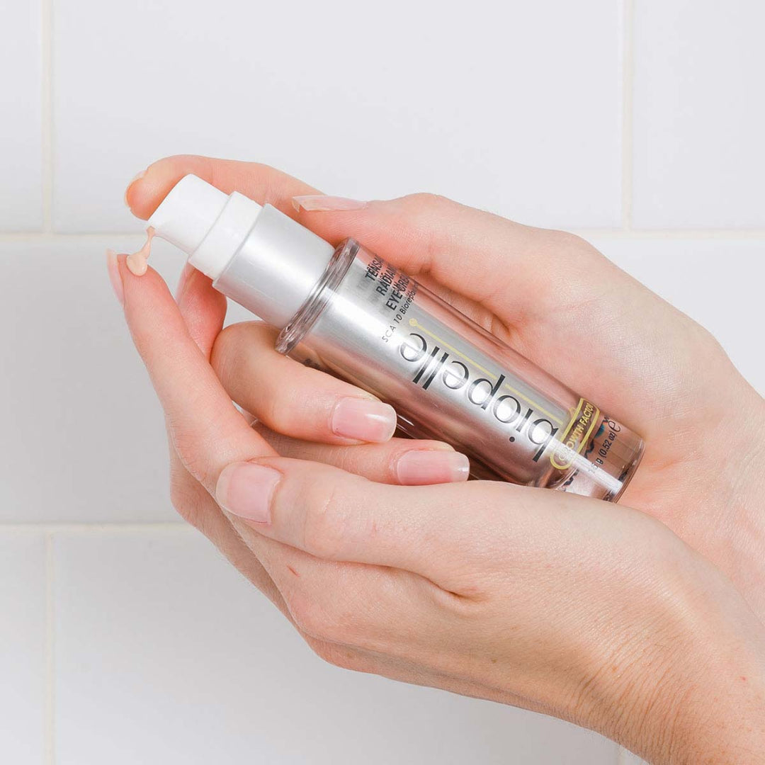 Biopelle Tensage Radiance Eye Cream being pumped into hand – lightweight growth factor eye cream with SCA 10 Biorepair Index, Hyaluronic Acid, Peptides and Antioxidants for youthful-looking eyes