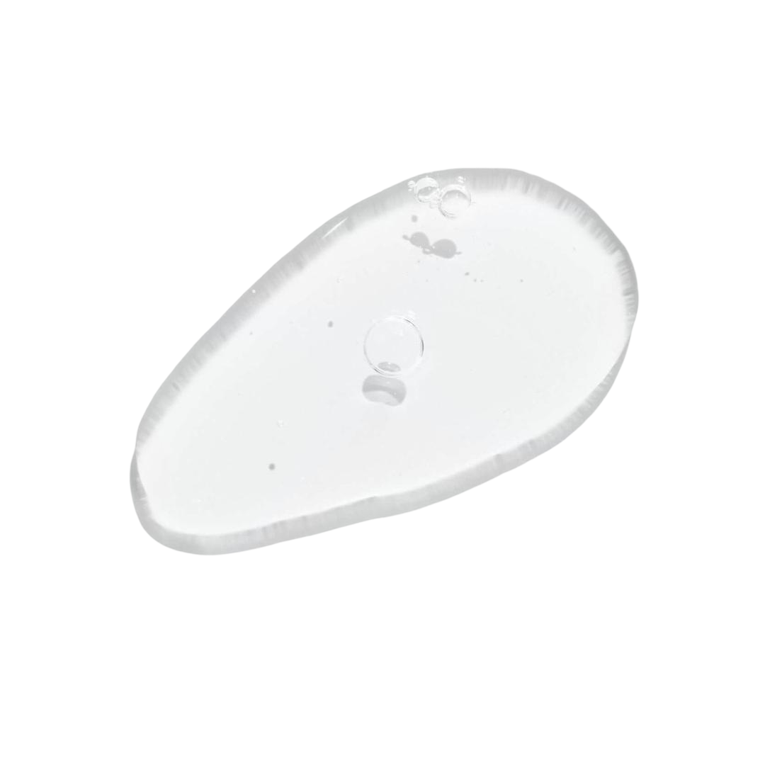 Clinical Skin A.C.E Purifying Toner texture close-up – lightweight clear gel formula shown as a transparent drop on white background for detoxifying and decongesting skin