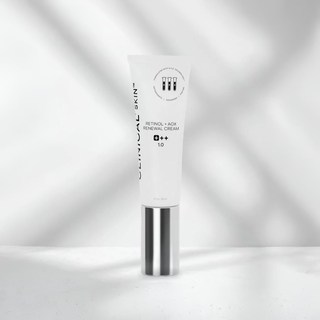Clinical Skin Retinol AOX Renewal Cream 1 oz white tube with silver cap on soft grey background with directional lighting