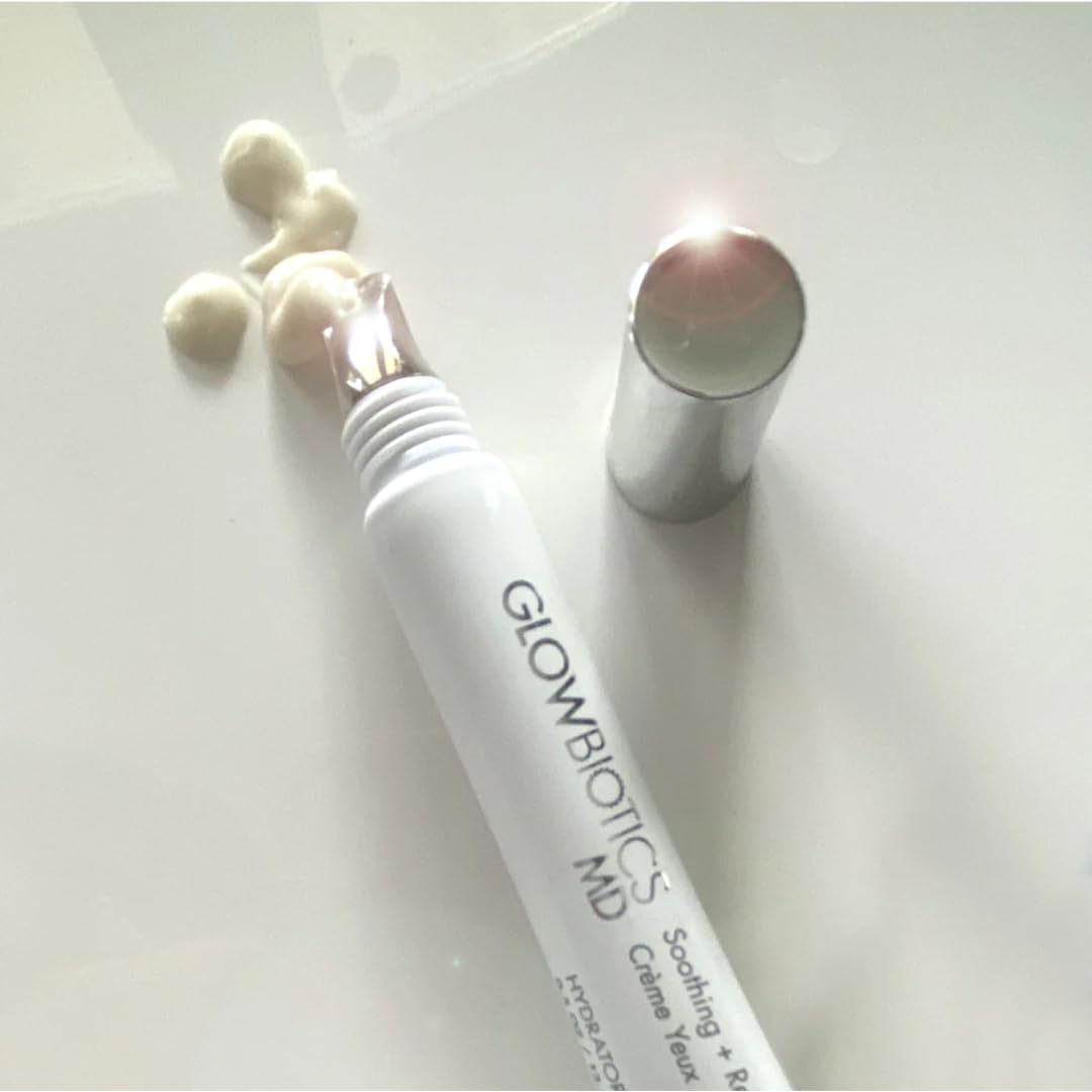 Glowbiotics Soothing + Revitalizing Eye Cream texture dispensed from the tube's tip with cap removed