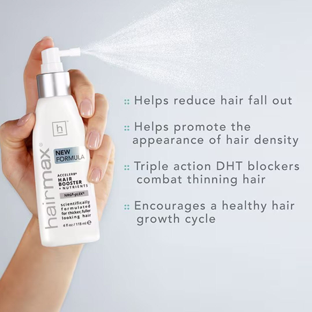 HairMax Acceler8 Hair Booster + Nutrients being sprayed from bottle held in hand with benefits reduces hair fall out and combats thinning hair