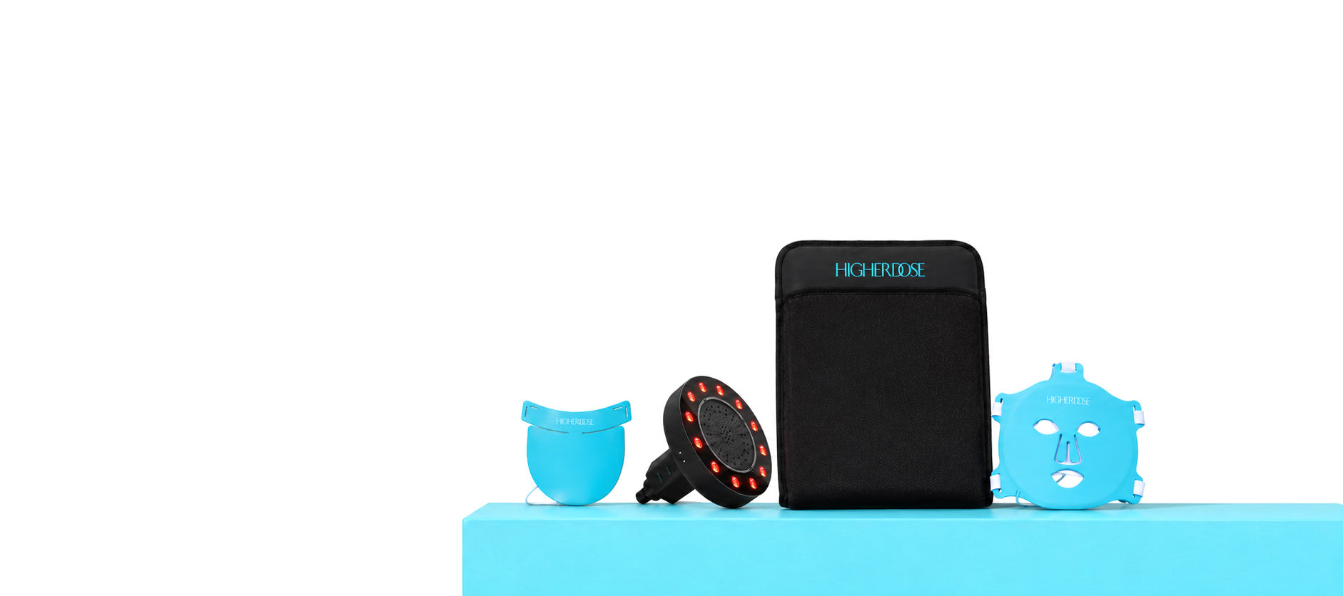A black rectangular device with the brand name 'IN2EDEN' printed in blue on the front, displayed on a bright blue platform against a white background, alongside three translucent blue accessories.
