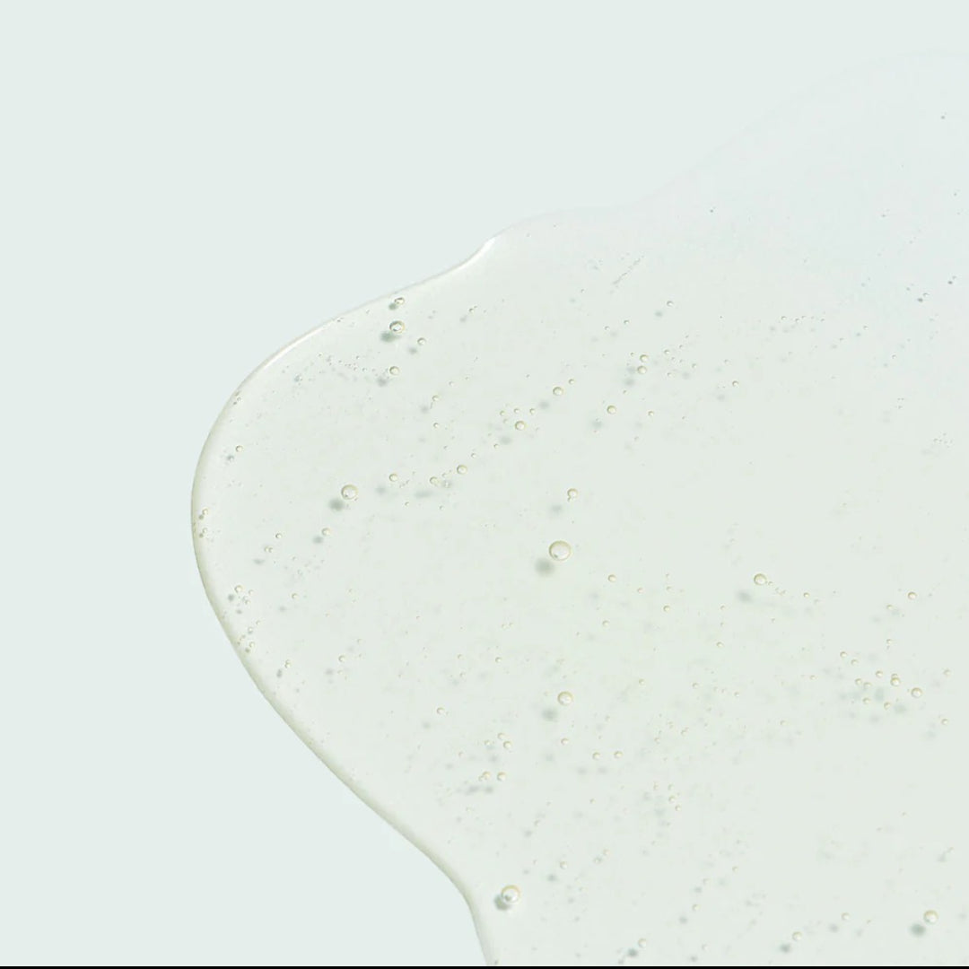 Image Skincare Ageless Total Anti-Aging Serum lightweight clear gel formula texture close-up showing the smooth serum with fine bubbles that absorbs quickly to firm and rejuvenate skin
