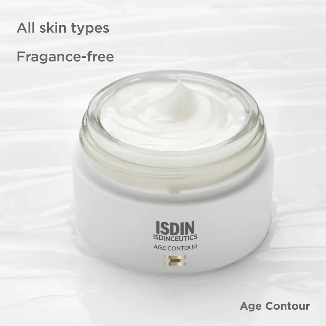 Open ISDIN AGE Contour jar showing whipped cream texture with text all skin types fragrance free