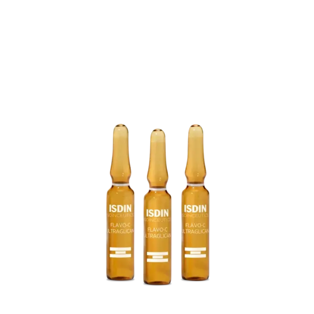 Three ISDIN Flavo-C Ultraglican amber glass ampoules standing upright