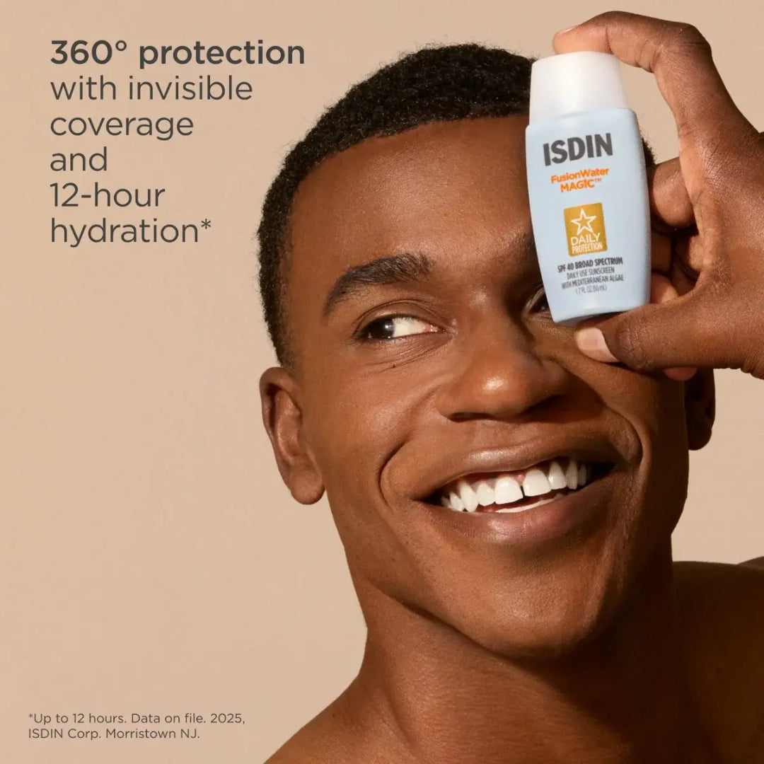 Smiling man holding ISDIN Fusion Water Magic bottle near his eye with text 360 degree protection with invisible coverage and 12 hour hydration