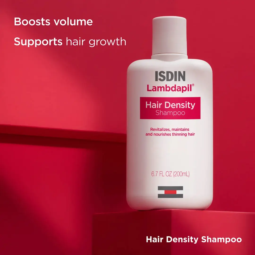 ISDIN Lambdapil Hair Density Shampoo bottle on red background with text boosts volume supports hair growth