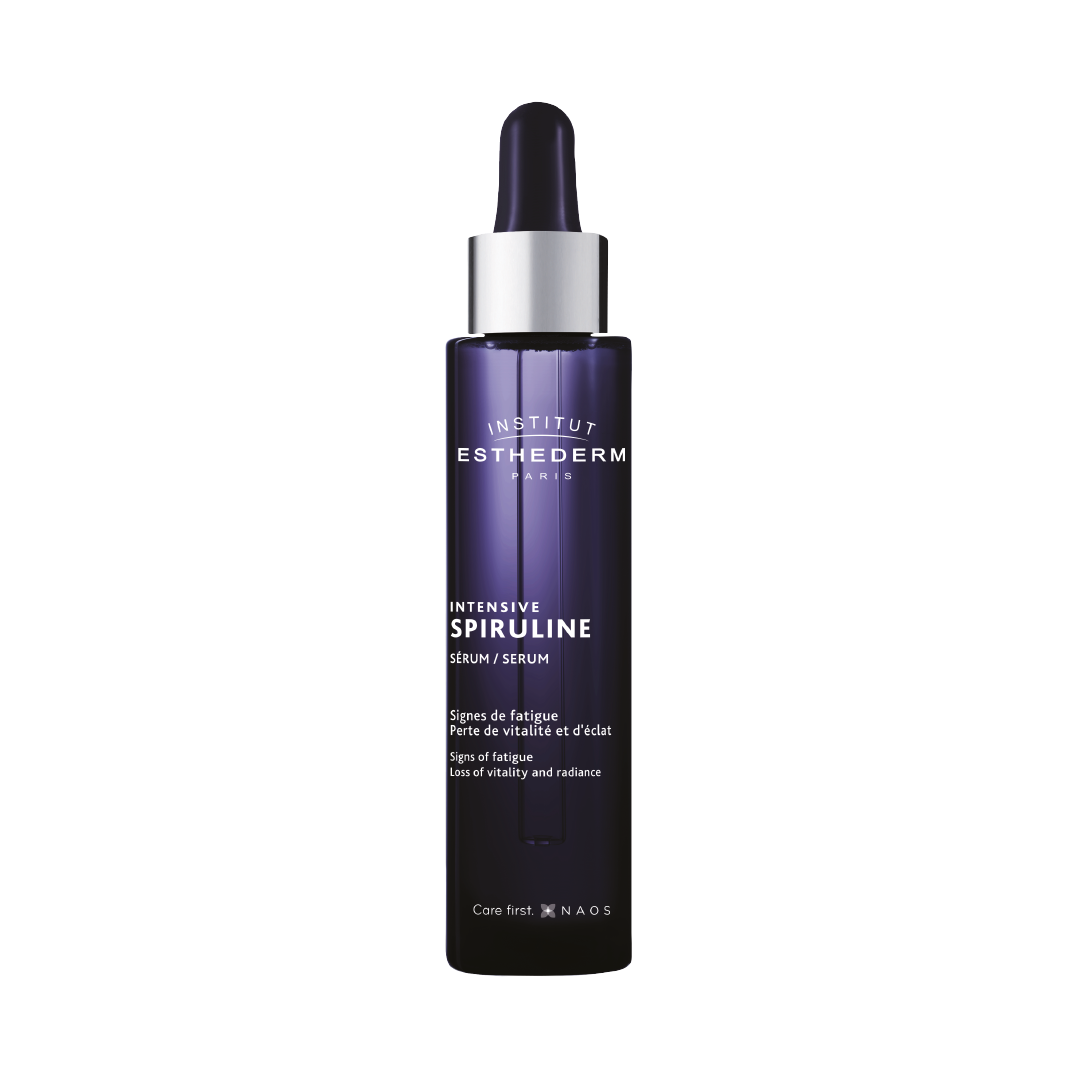 Institut Esthederm Intensive Spiruline Serum dropper bottle shown against a white background, for signs of fatigue, loss of vitality and radiance