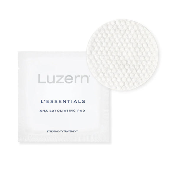 Luzern L'Essentials AHA Exfoliating Pad packet with a close-up of the textured pad