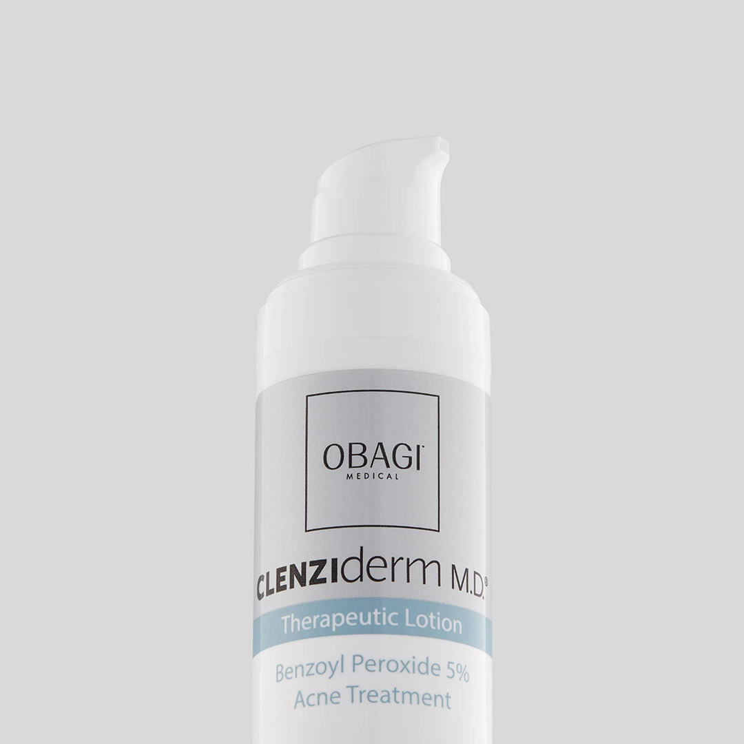Obagi CLENZIderm MD Therapeutic Lotion Benzoyl Peroxide 5% Acne Treatment label close-up on gray background