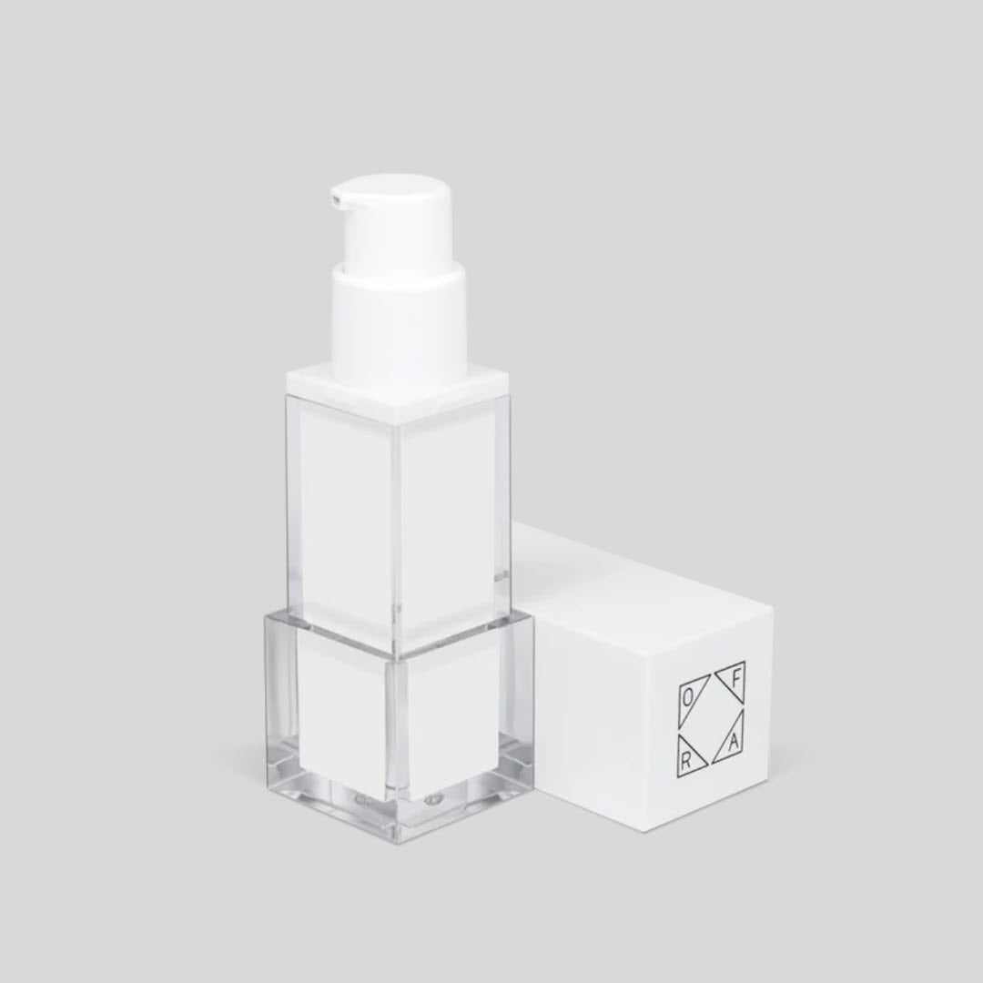 OFRA Cosmetics Absolute Cover Face Primer pump bottle standing beside its box at an angle
