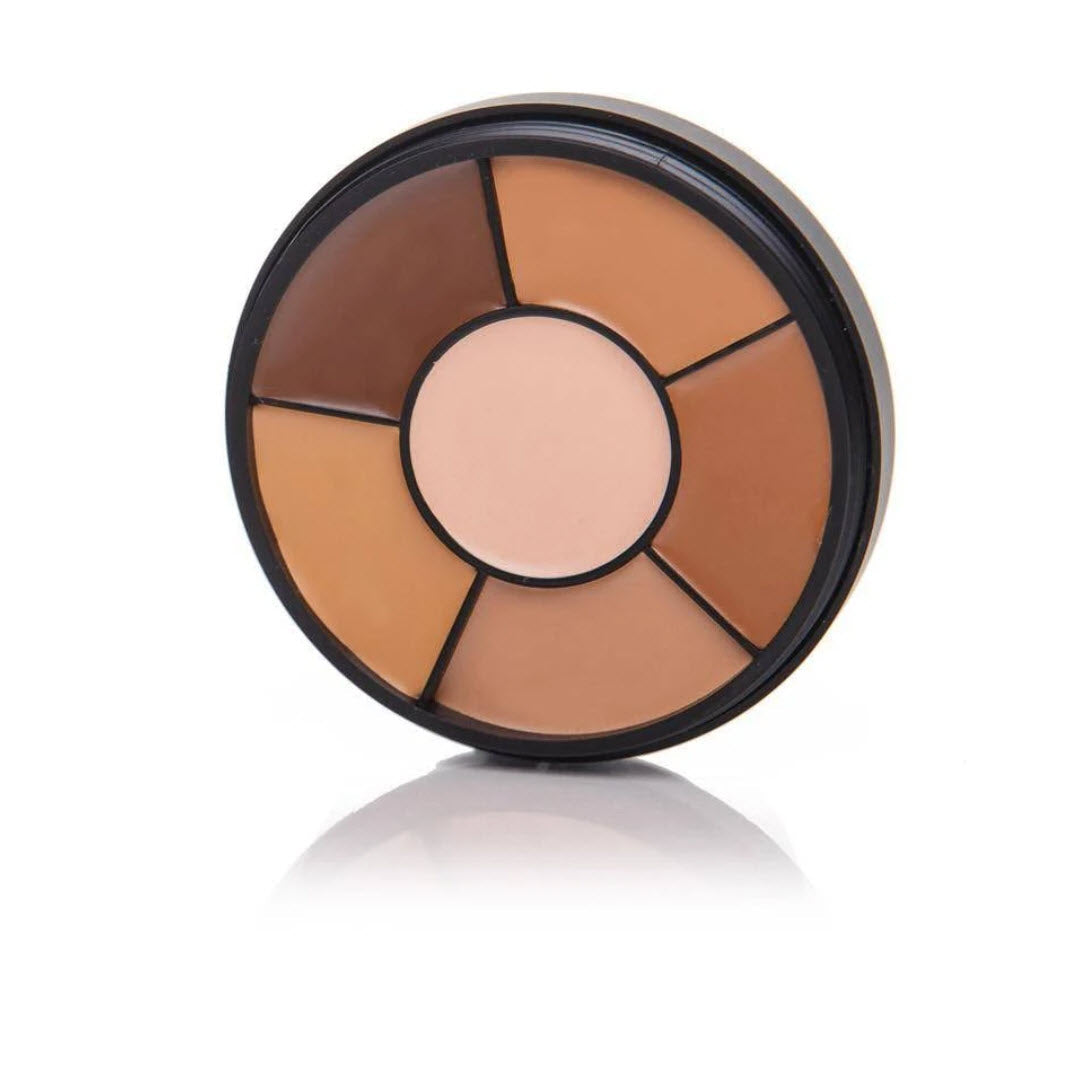 OFRA Cosmetics Deep Corrector Wheel shown at an angle displaying the six-shade cream compact