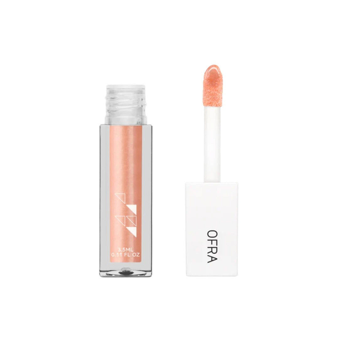 OFRA Cosmetics Lip Gloss tube and applicator wand in Apricot Dream, a shimmery peach