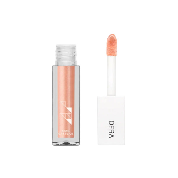 OFRA Cosmetics Lip Gloss tube and applicator wand in Apricot Dream, a shimmery peach