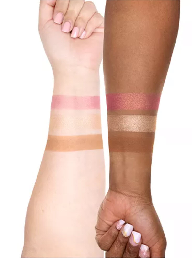 Swatches of the three OFRA Cosmetics Midi Palette Toasted Cashmere shades on two skin tones