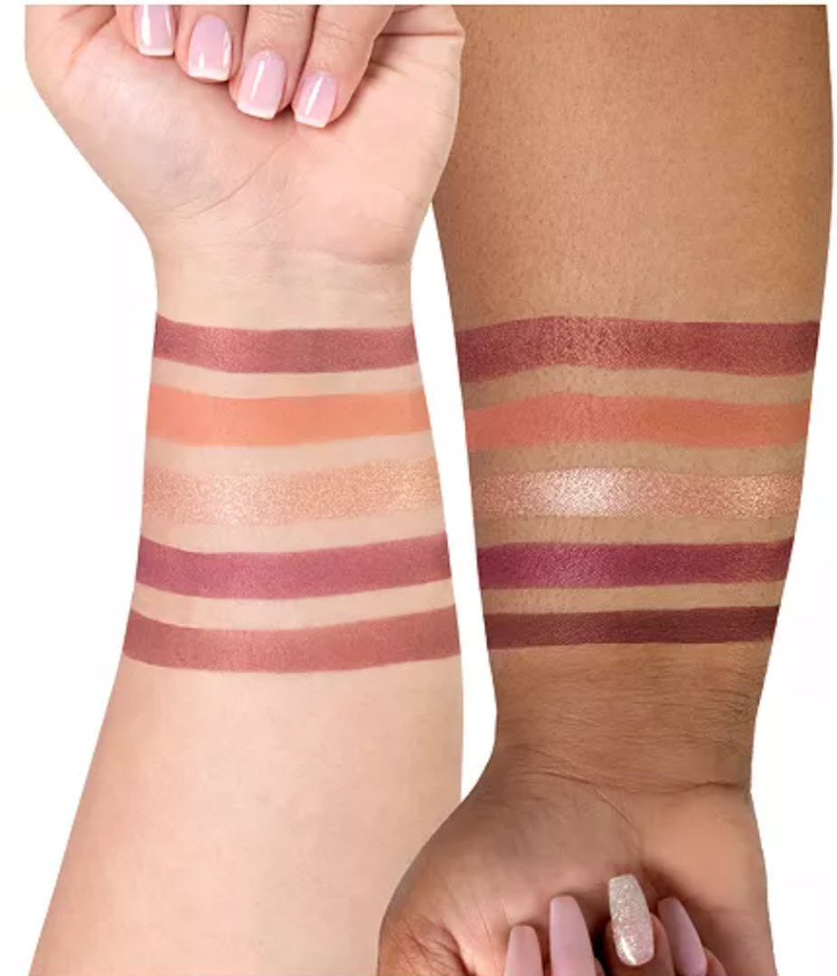 Swatches of the five OFRA Cosmetics Signature Palette Symphony shades on two different skin tones