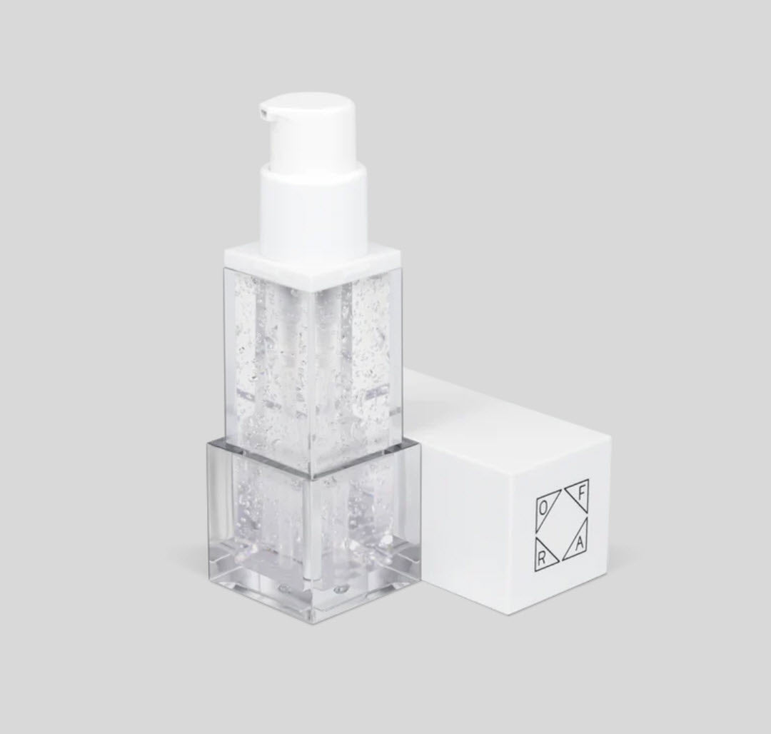 OFRA Cosmetics Silicone Primer clear gel pump bottle standing beside its box at an angle
