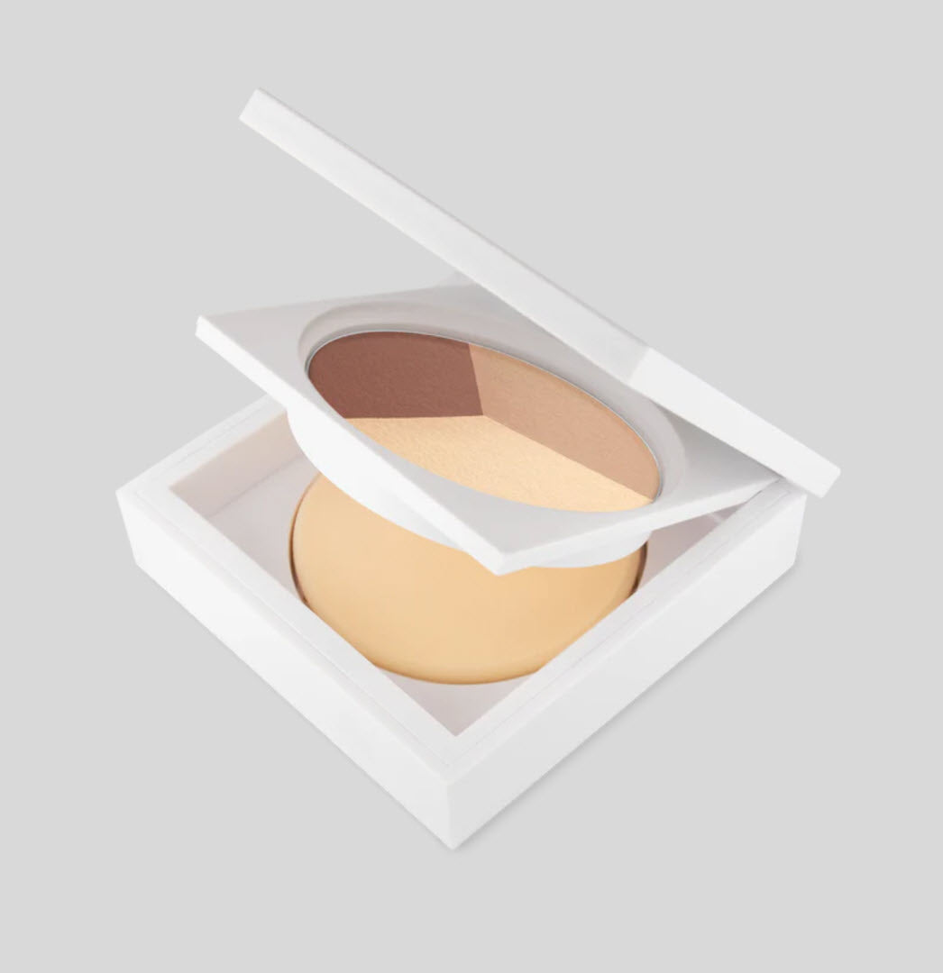Open OFRA Cosmetics Wet & Dry Foundation Trio compact showing the three-shade pressed powder pan