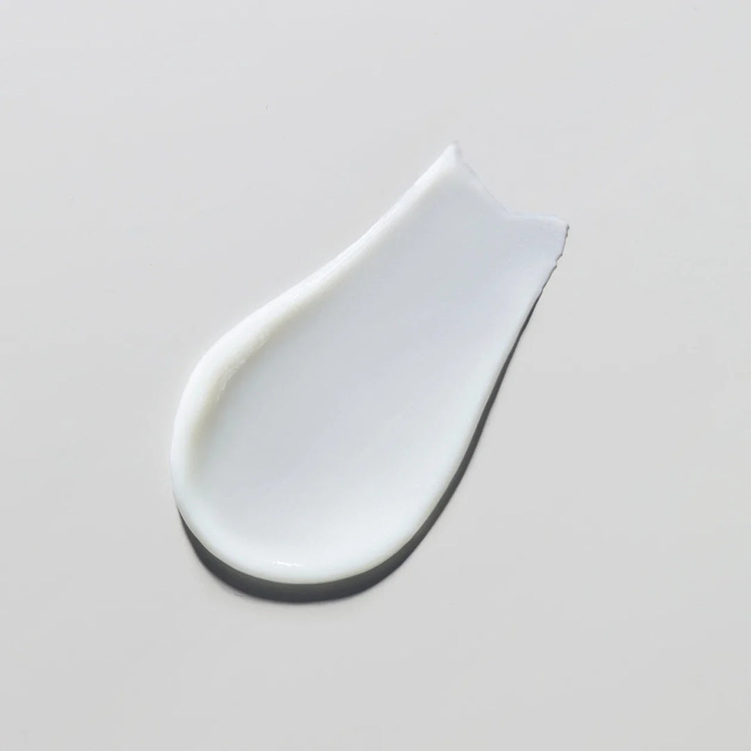 Obagi Retinol 0.5 cream texture swatch on gray background