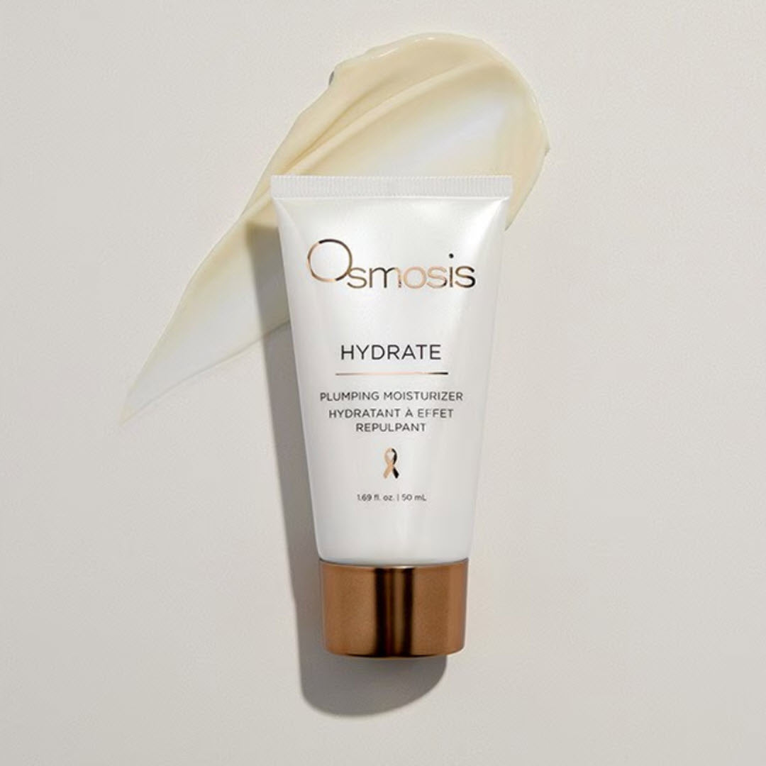 Osmosis Hydrate Plumping Moisturizer tube with a swipe of the pearlescent cream formula