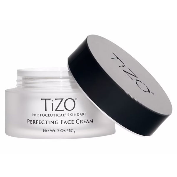 TiZO Perfecting Face Cream jar with lid open shown against a white background