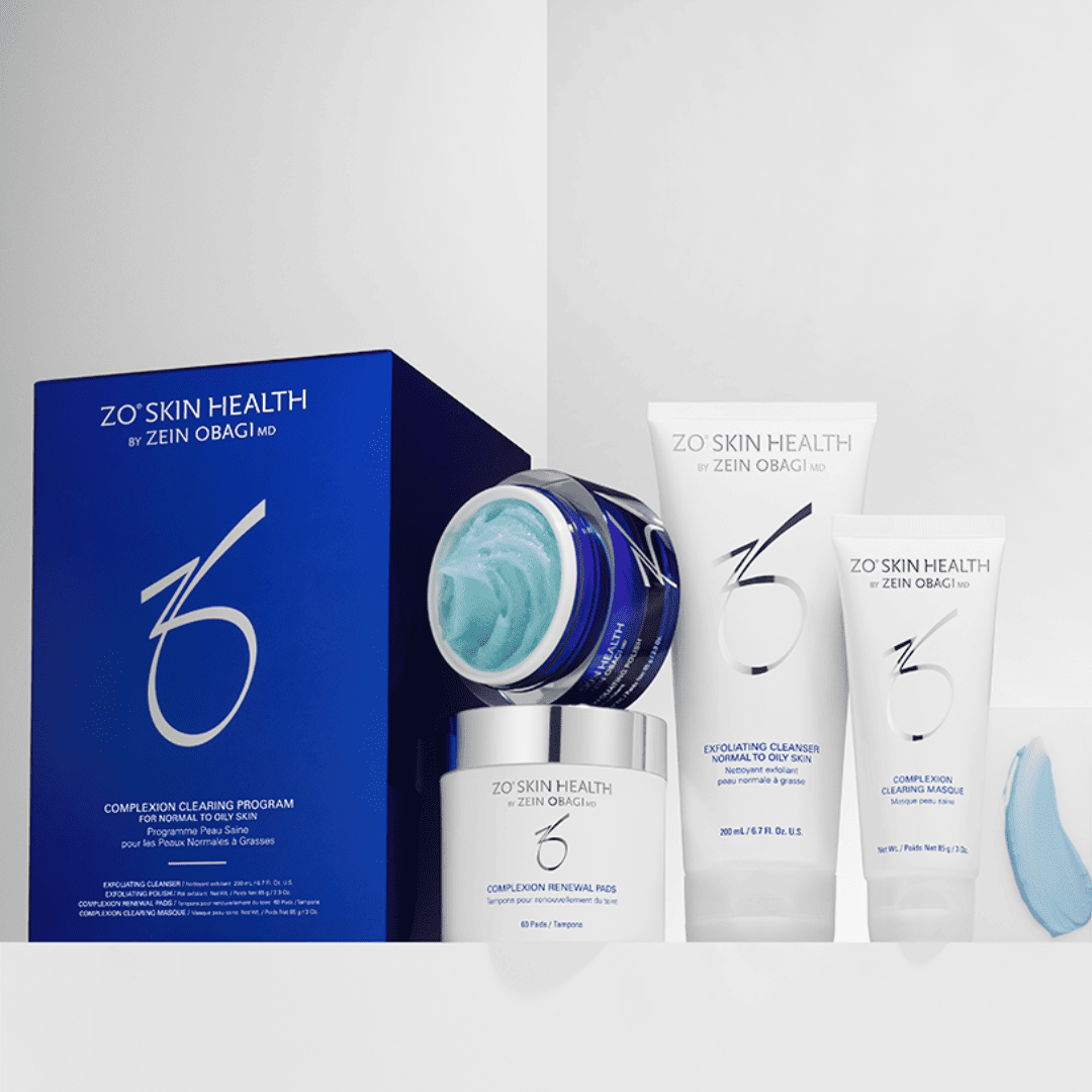 ZO Skin Health Complexion Clearing Program kit box with included products arranged on blue and white backdrop – complete acne-clearing skincare set