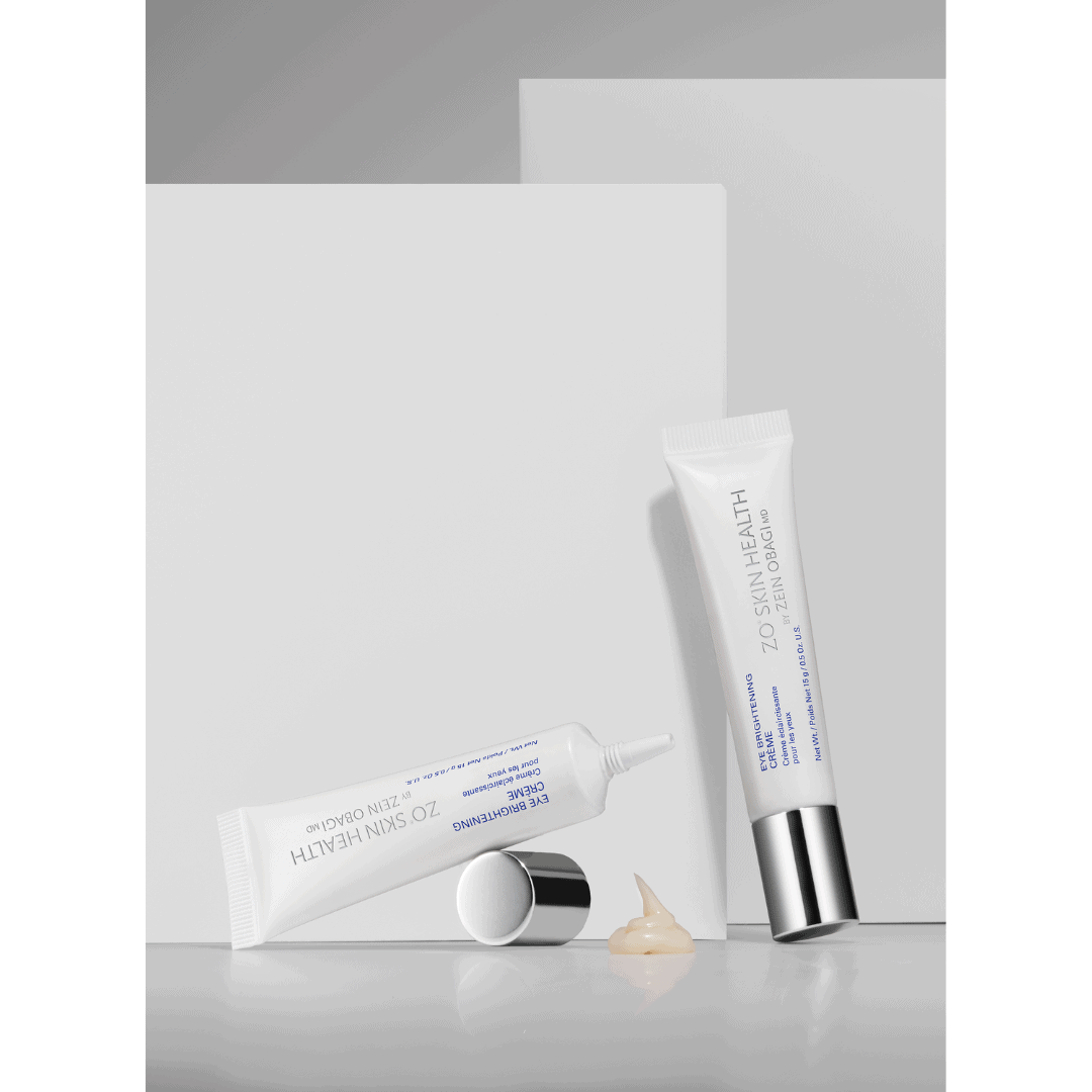 ZO Skin Health Eye Brightening Crème tube open showing rich cream formula – anti-aging eye treatment for dark circles and fine lines