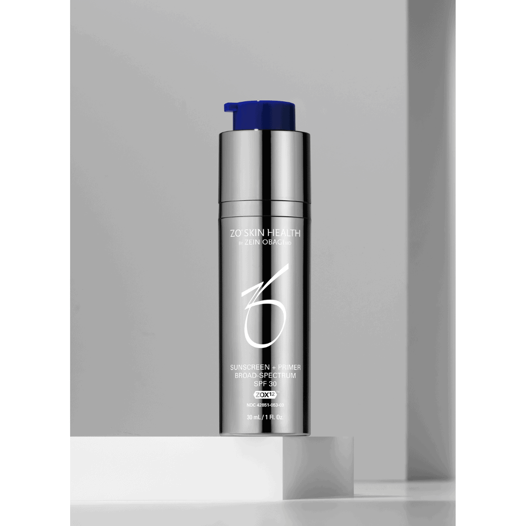 ZO Skin Health Sunscreen + Primer Broad Spectrum SPF 30 silver pump bottle on white pedestal – lightweight daily SPF primer for sun protection and smooth makeup application