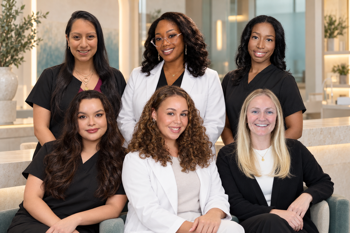 A skincare professional consulting with a patient
