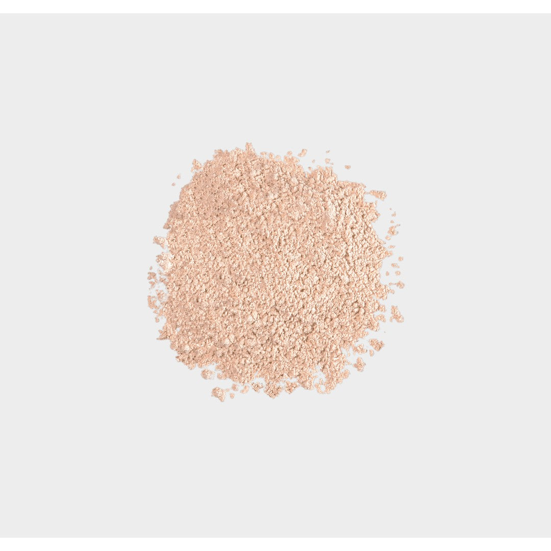 Swatch of iS Clinical PerfecTint Powder SPF 40 in a light shade